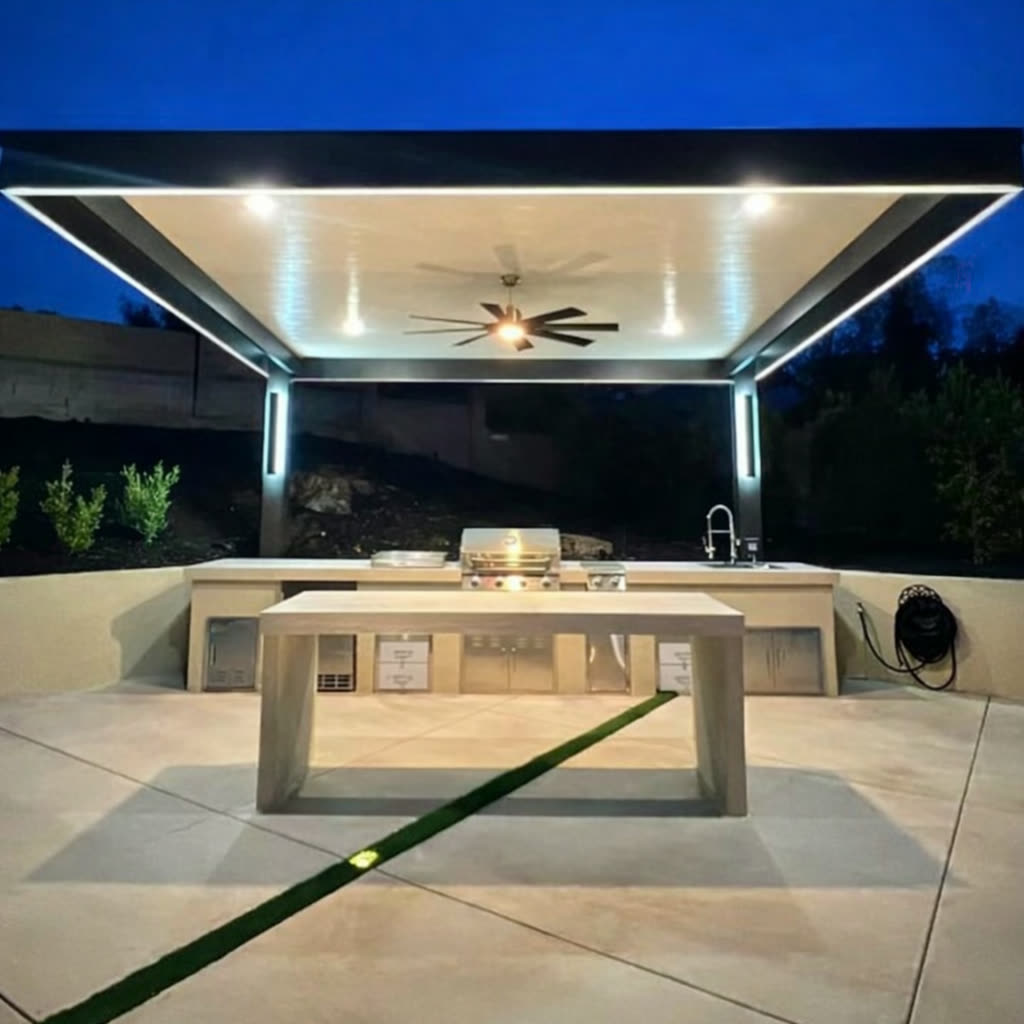 Custom powder-coated aluminum pergola shading a luxury backyard patio in Littleton, Colorado