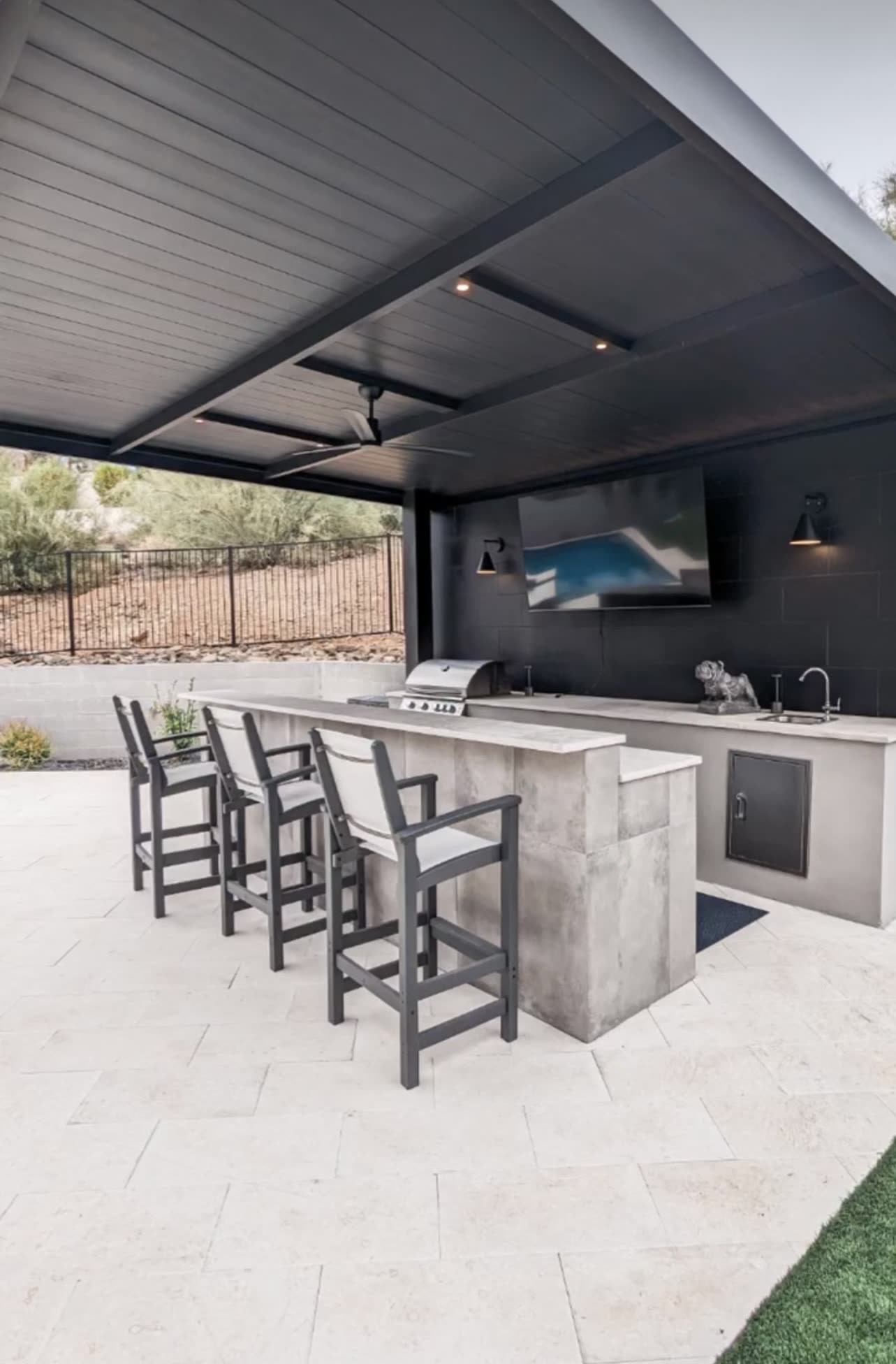Custom aluminum pergola over an outdoor kitchen in Castle Rock, Colorado
