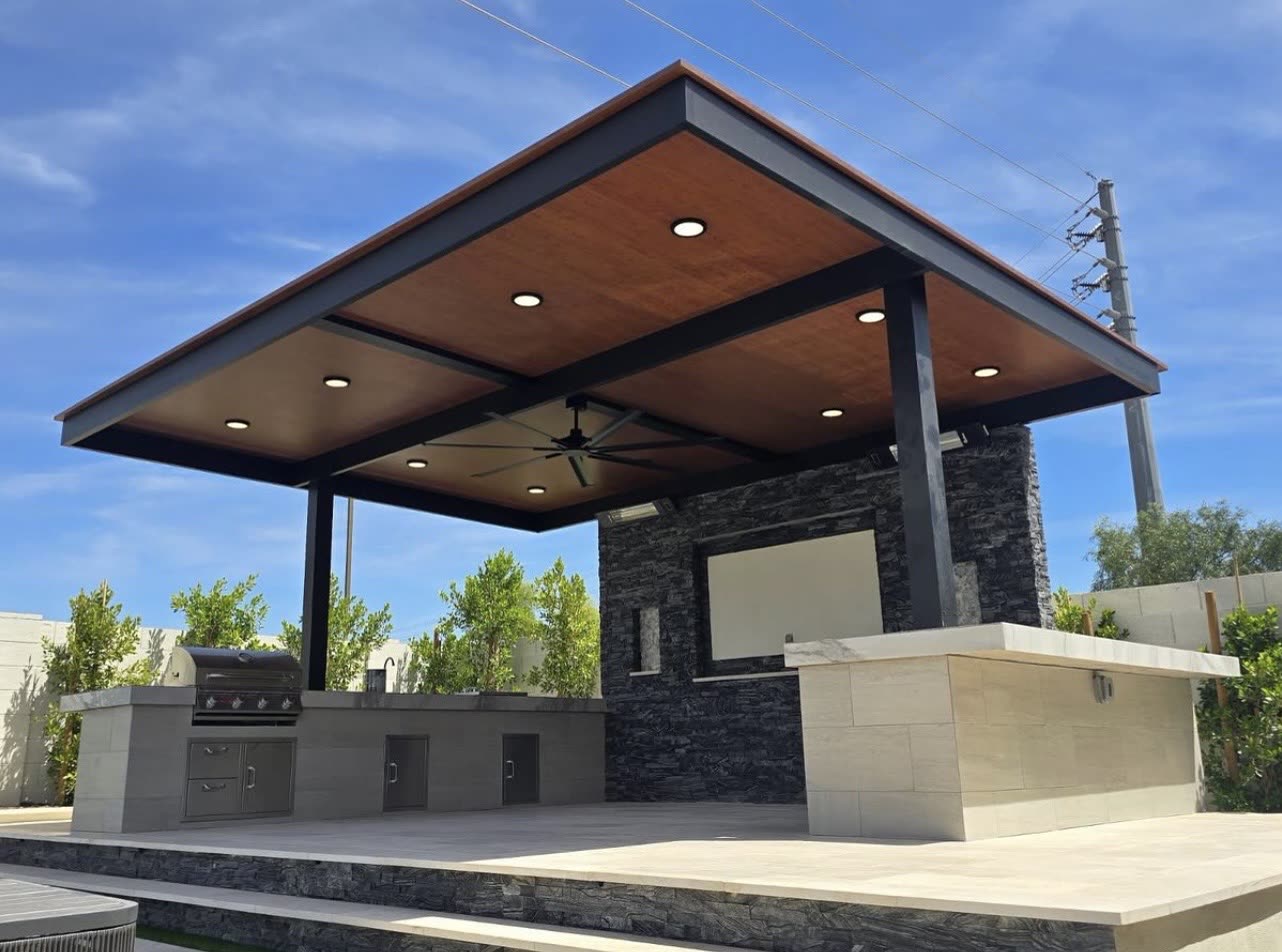 Custom black aluminum pergola over a poolside patio in Littleton, Colorado