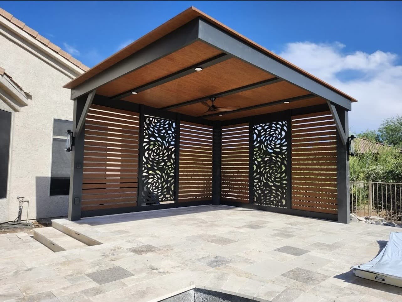 Freestanding aluminum pergola with fans and lighting in Lone Tree, Colorado